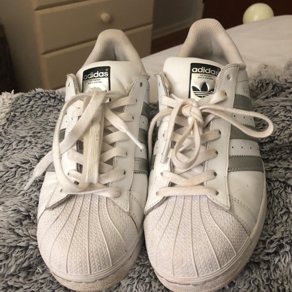 Adidas superstar shoes; silver detail